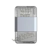 Transparenter Mini-Hefter mit "OstationY" Schriftzug und sichtbarem Heftmechanismus.