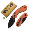 Kizer Halloween Taschenmesser in Orange mit Kürbis-Design, schwarzer Klinge und Trick or Treat Aufdruck samt Box