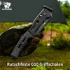 Rutschfeste G10 Griffschalen eines HX Outdoors Outdoor-Messers in einer behandschuhten Hand beim Camping