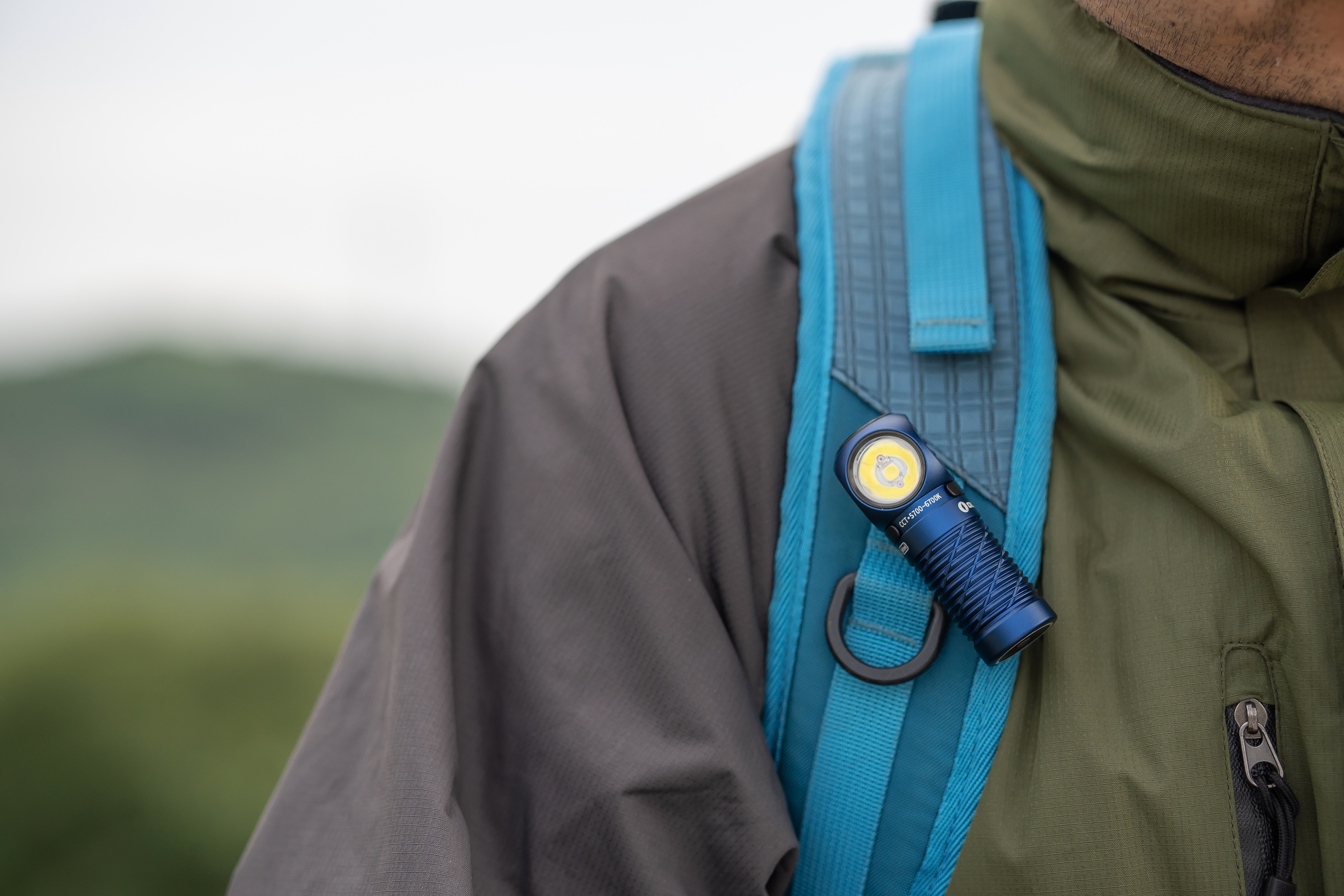 Olight Perun 3 Mini im offiziellen Anwendungsfoto