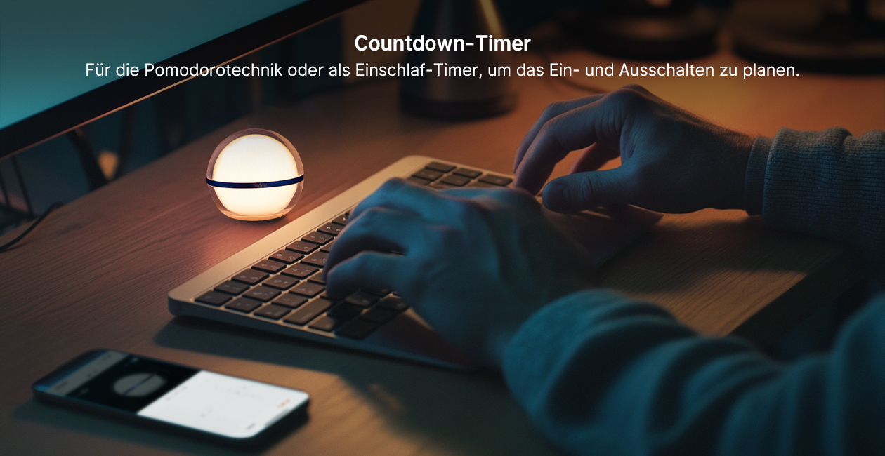 Sphere neben einem Computerarbeitsplatz mit Darstellung der Timerfunktion